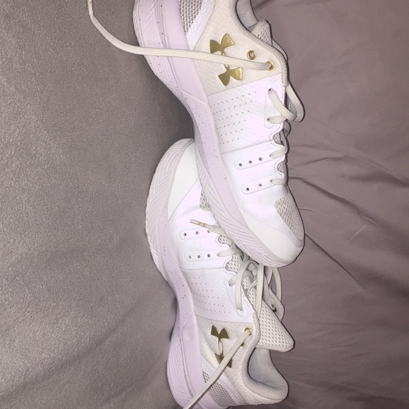white and gold under armour volleyball shoes